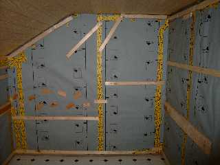 back wall with vapor retarder and battens